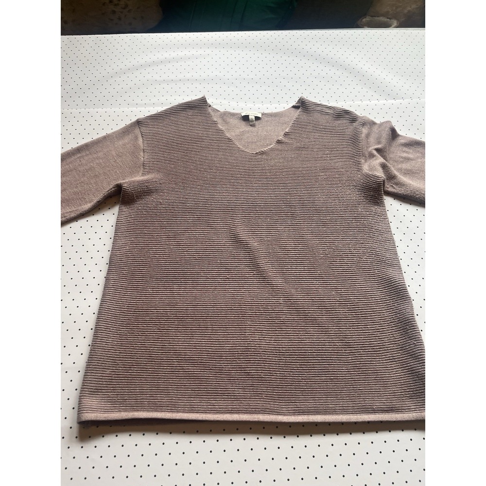 Soft neutral ribbed sweater with timeless minimalist styling